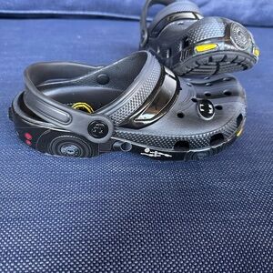 CROCS Black Clogs with Yellow Highlights